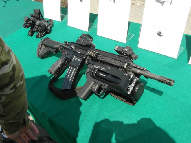 HK 416 assault rifle  optionally with grenade launcher
