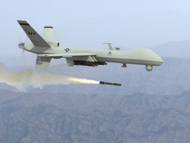 Predator MQ-9 Reaper Firing A Hell Fire Missile