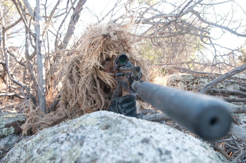 SEAL sniper properly concealed with clear bullet path. Photo courtesy U.S. Navy.