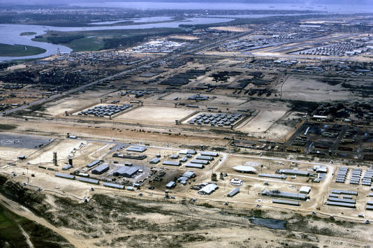 This is a photo of FOB 4 taken from Marble Mountain facing north. This is a photo taken after 1970. The first compound next to the mountain is FOB 4. At the time of the attacks, the compound wasn't this well constructed. The Recon Team area is in the upper right, with the indigenous troops barracks on the right, with the long buildings facing east-west. The Green Beret recon buildings are the small ones on the right.