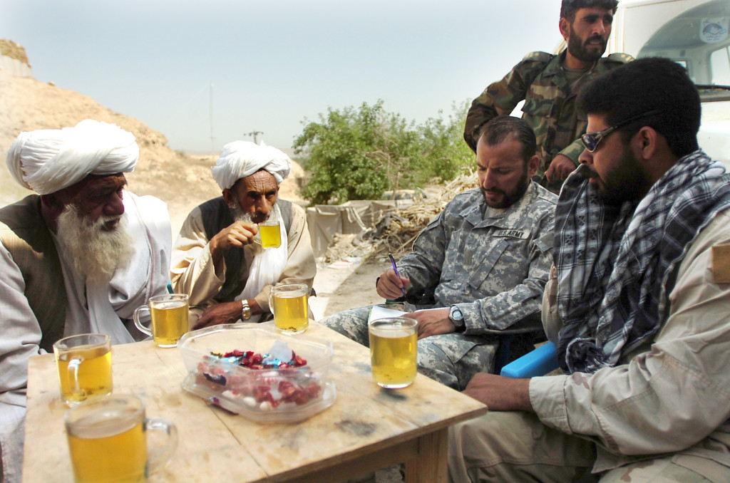 A Special Forces company commander meets with village elders and members of the 1st Kandak, 209th Afghan National Army Corps April 10, 2007, to discuss military operations in the Sangin District area at an undisclosed forward operating base in Helmand Province, Afghanistan. (U.S. Army photo by Spc. Daniel Love) (Released)