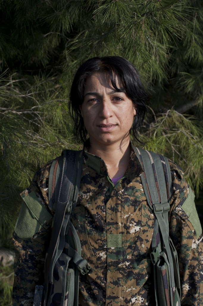 Haval Jiyan poses for a portrait outside a Kurdish military base in al Malikiya (Derek to the Kurds), Syria, November 18, 2014. She is a senior commander of the YPJ, the female unit of the volunteer Kurdish People's Protection Units.