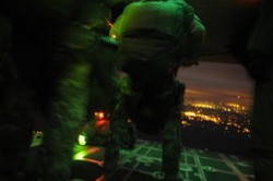 Combat Weathermen prepare to jump by night
