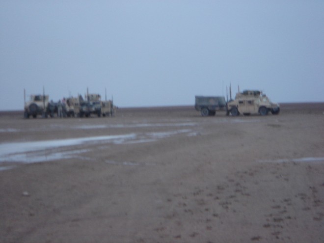 Hitting the road in about a dozen armored Humvees