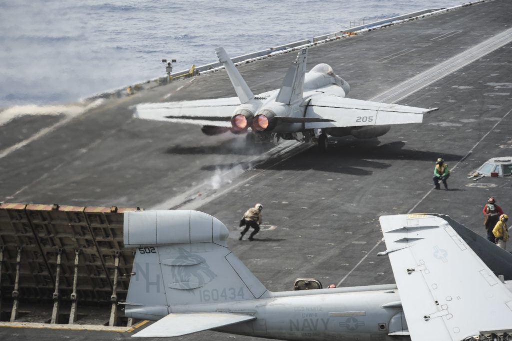 An F/A-18E Super Hornet assigned to the Argonauts of Strike Fighter Squadron (VFA) 147 launches off the flight deck of the aircraft carrier USS Nimitz (CVN 68). The Nimitz Carrier Strike Group is deployed to the U.S. 5th Fleet area of responsibility conducting maritime security operations and theater security cooperation efforts. (U.S. Navy photo by Mass Communication Specialist Seaman Apprentice Kelly M. Agee/Released)