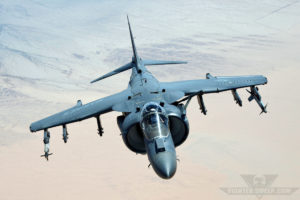A USMC AV-8B pulls up to the tanker to get fuel during a WTI sortie. ©Curt Jans--All Rights Reserved