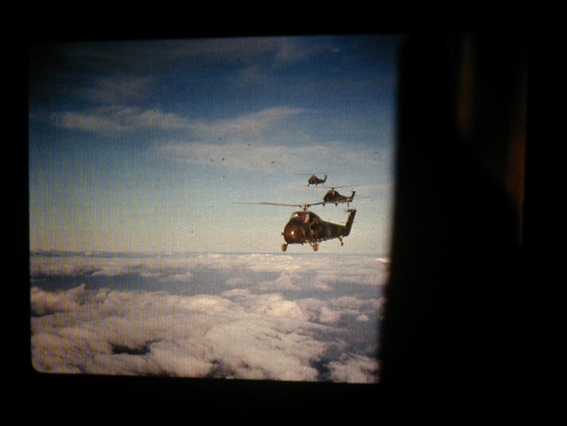 Three camouflaged Sikorsky H-34s from the South Vietnamese Air Force's 219th Special Operations Squadron flying enroute to inserting a team into Laos in October or November 1968 from FOB 1, the top secret SOG compound in Phu Bai. At least two were shot down Oct. 5, 1968 flying in support of ST Alabama. (Photo courtesy of Jerry Herman
