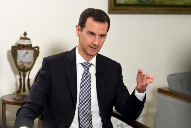 Assad says he can form new Syria government with opposition