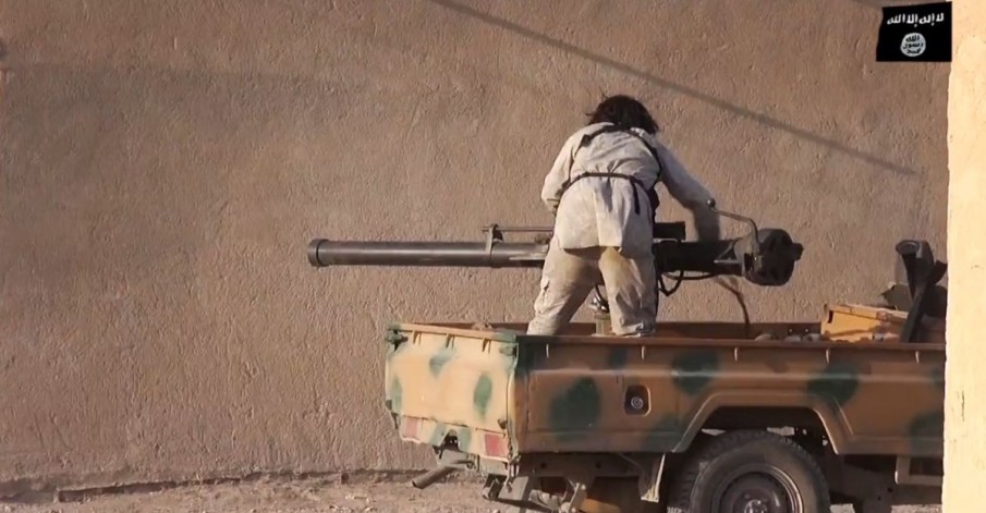 ISIS sniper arsenal: Jihadi uses 8ft rife that rips down walls