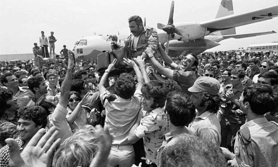 Israeli rescue pilot returns home to cheers after a group of Israeli commandos flew thousands of miles to Entebbe airport in Uganda and rescued 102 hostages held by Palestinian hijackers, Tel Aviv, 1976