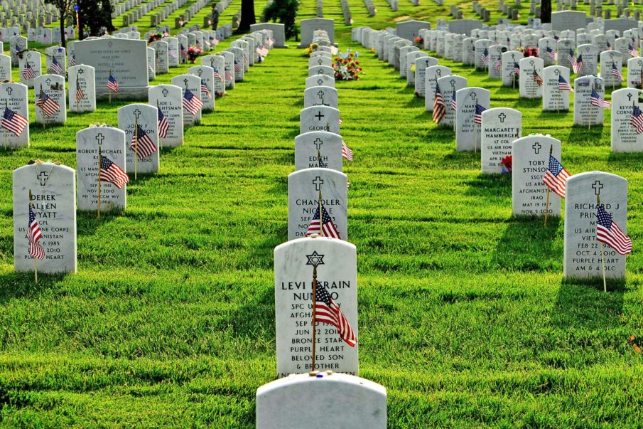 Soldiers placing 230,000 US flags at Arlington National Cemetery