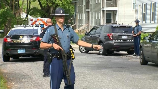 Officers establish a cordon around the duplex in Oxford. Image courtesy of Massachusetts State Police. 