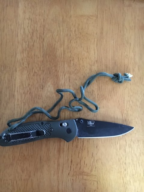 A Navy SEALs folding knife: Benchmade D2 Griptilian