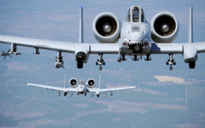Two A-10C Thunderbolt II aircraft fly a flight training mission March 16, 2010, over Moody Air Force Base, Ga. The A-10C is the first Air Force aircraft specially designed for close-air support of ground forces. (U.S. Air Force photo/Airman 1st Class Benjamin Wiseman)