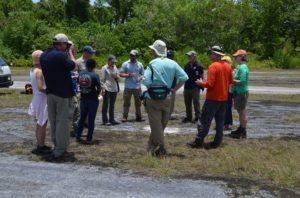 Members brief before an expedition. Photo: Derek Abbey