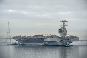 The aircraft carrier Gerald R. Ford (CVN 78) floats in the James River after being launched from dry dock at Newport News Shipbuilding, 11/17/2013. The ship will tied to an outfitting pier at the shipyard for equipment installation and testing. The carrier is scheduled for commissioning in 2015. The Ford is the first ship of a new class of nuclear-powered aircraft carriers built by Newport News Shipbuilding for the U. S. Navy. Photo by Chris Oxley, Newport News Shipbuilding.