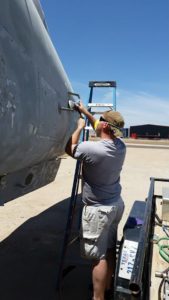 Tim's son, Sgt Michael Baer (formerly 82md Airborne) helping sand down Fast Eagle 102. 