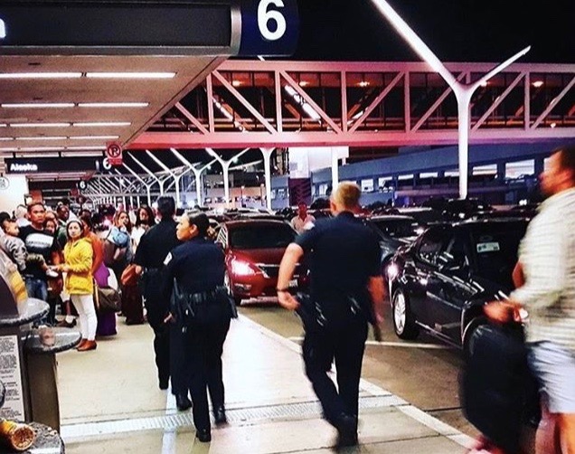 Passengers evacuated after reports of an active shooter at LAX airport