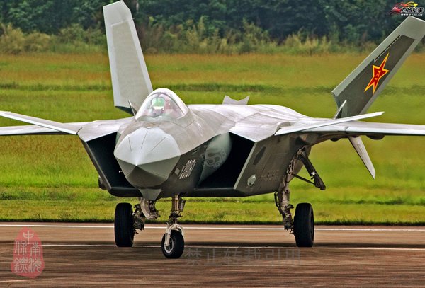Chinese J-20. Note the Raptor like appearance and intake designs.