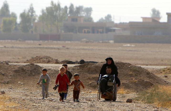 Iraqi in wheelchair makes risky escape from Islamic State