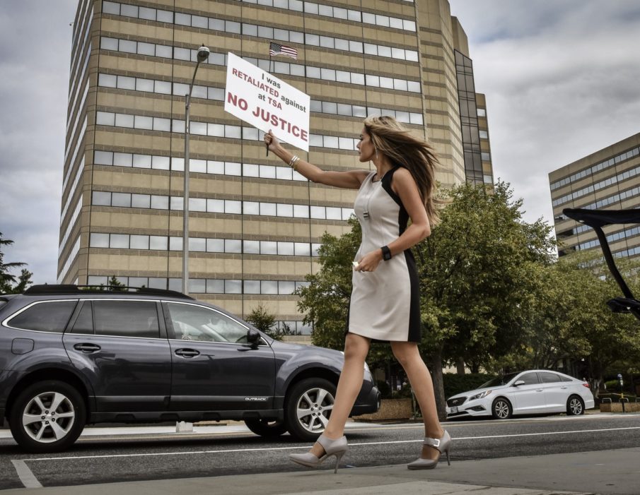 She says she was harassed by superiors. Now she protests outside the TSA for hours.