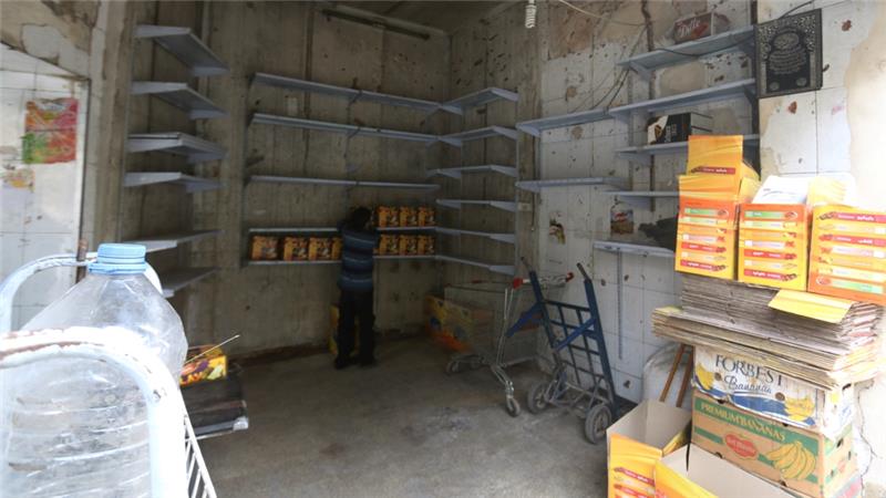 Syrian government texts east Aleppo residents to leave