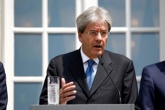 Italy hurries to form new government as banking crisis looms