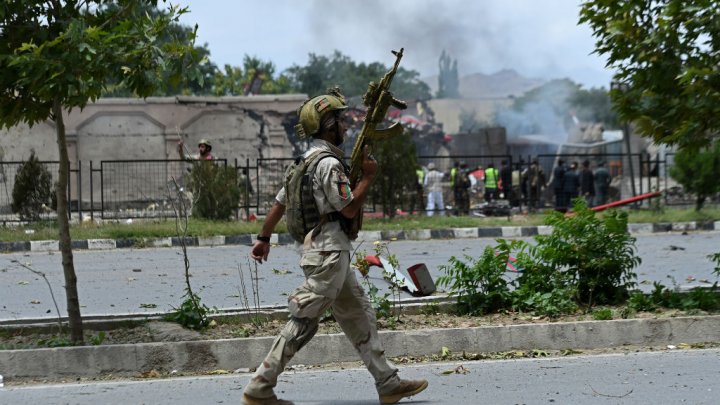Twin blasts kill dozens near Afghan parliament