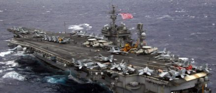 Watch: Pitching Deck! Waves over the bow of the USS Kitty Hawk!