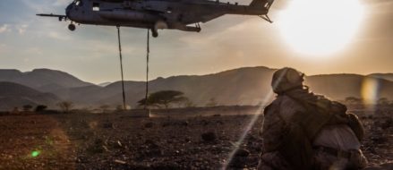 Picture of the day! US Marine Corps CH-53E Super Stallion lifts concrete barrier in Djibouti