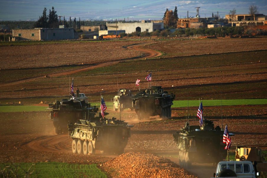 With a show of Stars and Stripes, U.S. forces in Syria try to keep warring allies apart