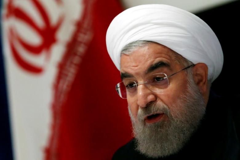 Rouhani talks rights as Iran election nears, critic attacks him on economy