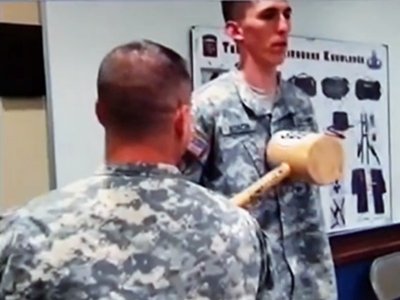 Navy officer charged with hazing after forcing sailor to carry around Charlie Brown figurine