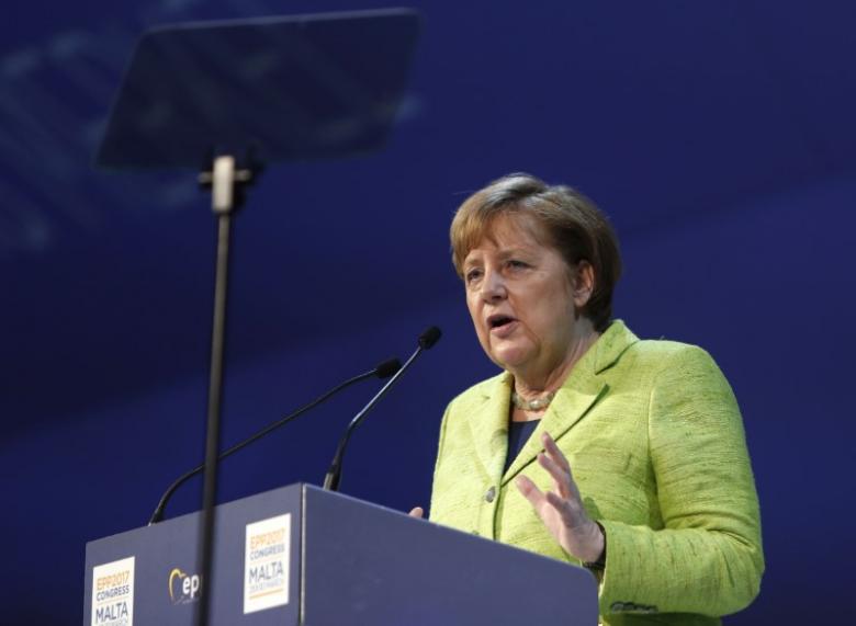 Merkel says migrants must respect tolerance, German laws