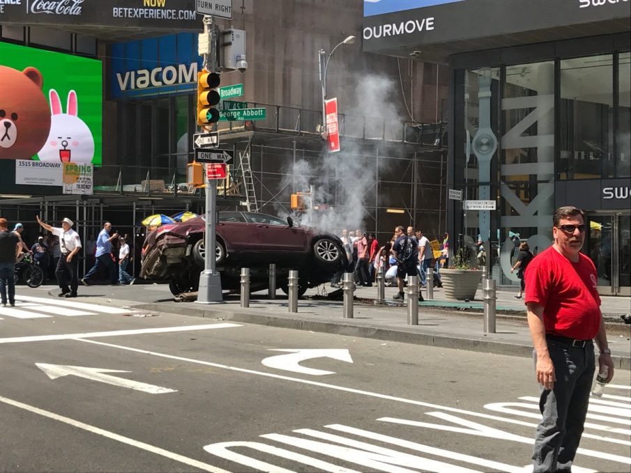 Police arrest a man in Times Square after hitting several pedestrians with his vehicle