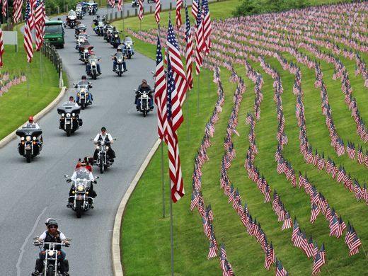 Motorcyclists ride into Indiantown Gap National Cemetery in Annville