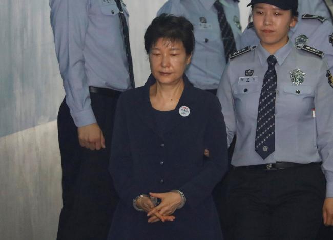 South Korea’s ex-leader Park makes first court appearance in corruption trial