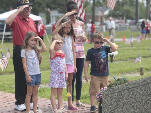 Veteran Tom Dellatore salutes fallen servicemen