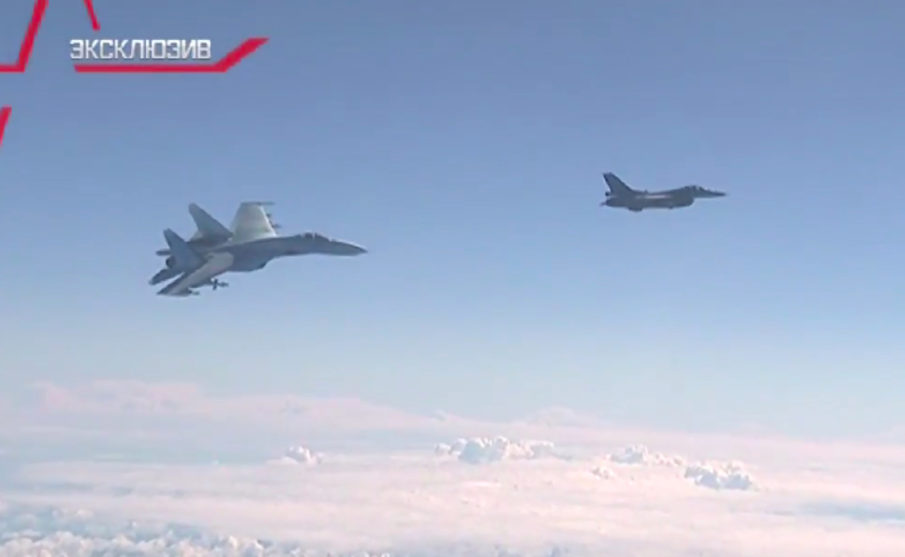 Watch: NATO F-16 intercepts Russian Defense Minister’s jet, warned away by Russian fighter