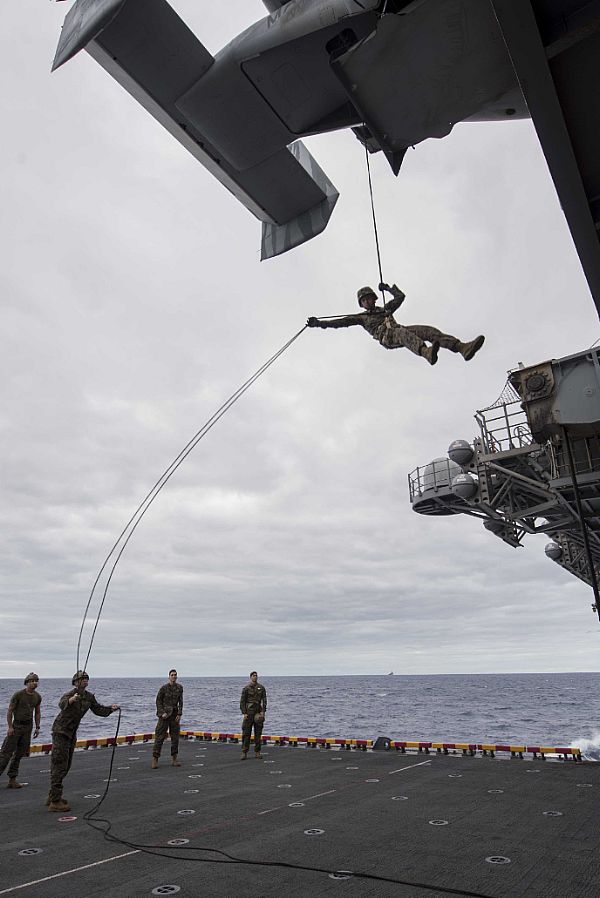 Picture of the Day: US Marine Rappelling from an MV-22B Osprey