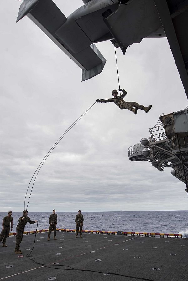 Picture of the Day: US Marine Rappelling from an MV-22B Osprey