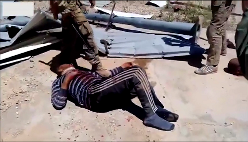 Watch: Video shows Russians torturing a Syrian prisoner with a sledgehammer (WARNING- GRAPHIC IMAGES)