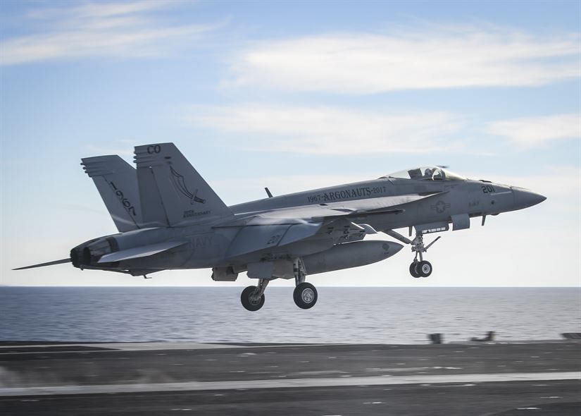 Iranian drone and U.S. Navy F/A 18 Super Hornet have near miss over the Persian Gulf