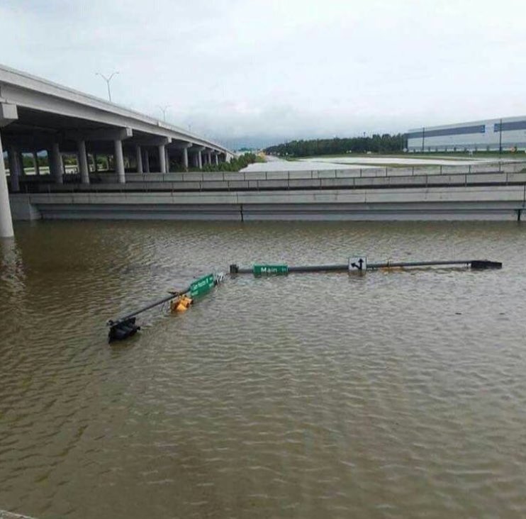 Houston beset by biblical flooding that closes airports, kills 2, and results in 1,500+ water rescues
