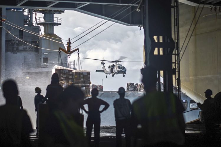 Picture of the Day: MH-60S Seahawk Helicopter Hovers USNS Charles Drew