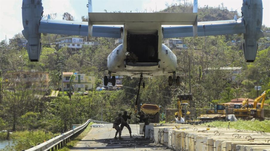 V-22 Osprey Tiltrotor working barriers to reinforce Guajataca Dam Puerto Rico