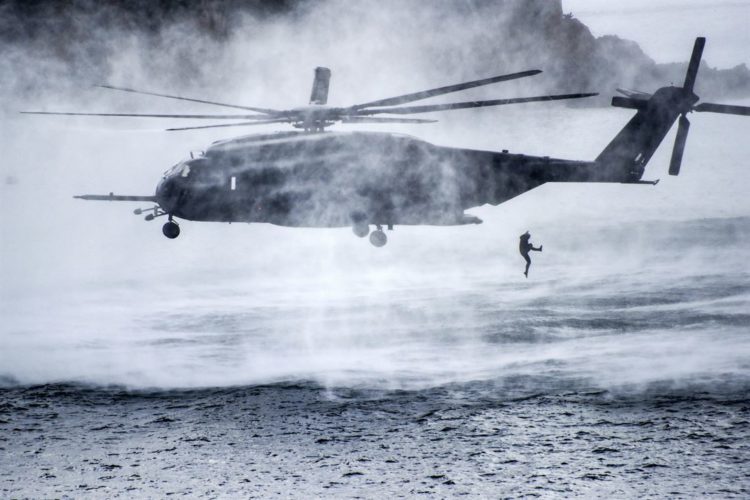 Picture of the Day: Service Member Jumps from Navy MH-53E Sea Dragon Helicopter
