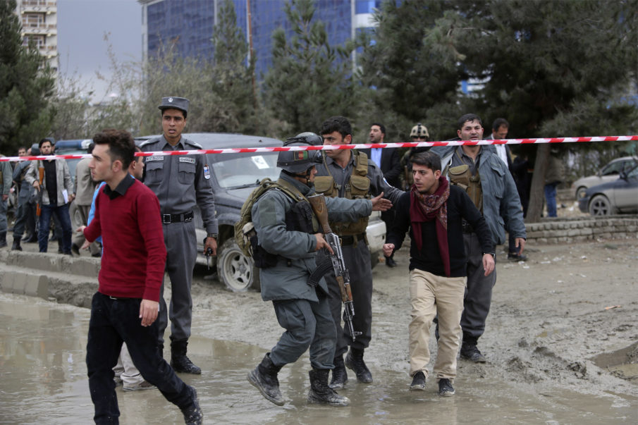 A policeman’s bear hug stops a suicide bomber from killing more