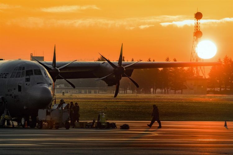 Picture of the Day: Crew Chief 374th Aircraft Maintenance Squadron Walks the Flight Line at Yokota Air Base