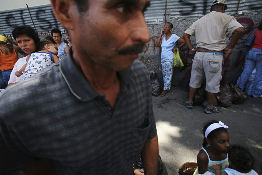 Venezuelans scramble to survive as merchants demand dollars